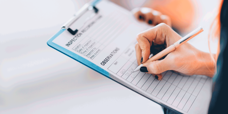 Facility management technician filling inspection-Image credit-iStock-499147978