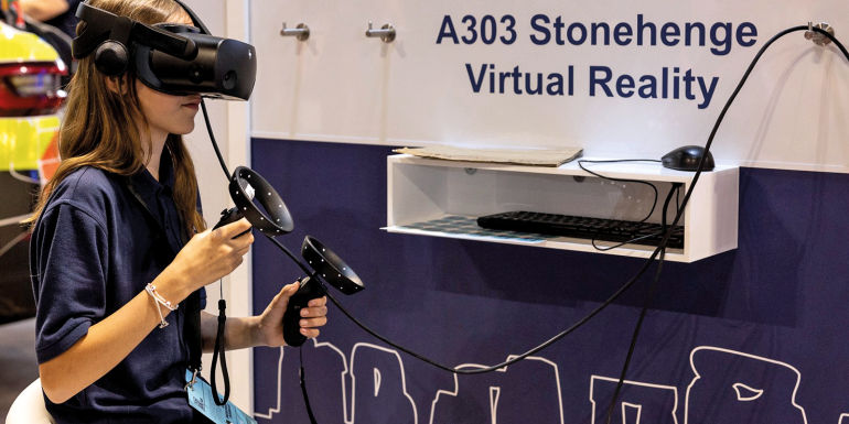 young visitor uses vr to bring stonehenge to life