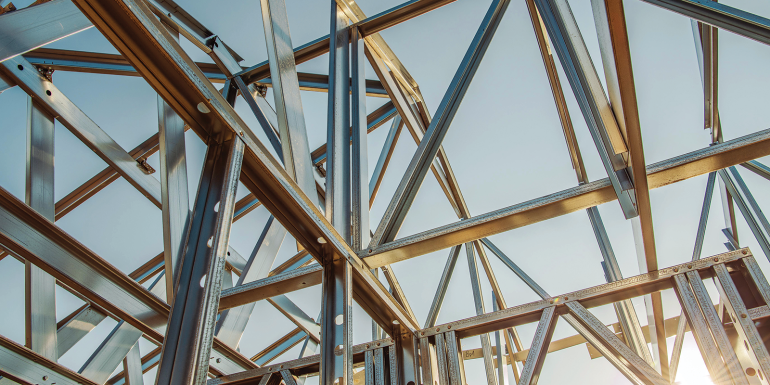 Building Steel Skeleton Frame at Sunset.