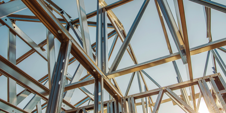 Building Steel Skeleton Frame at Sunset. 