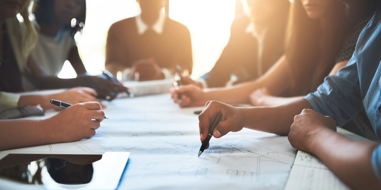 Cropped shot of a group of architects working together on a project