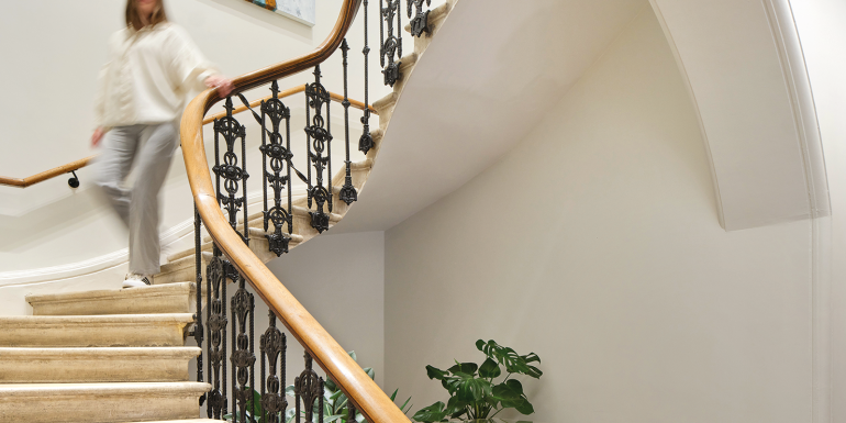 Much of the existing building fabric – including a cantilevered stone staircase and mosaic-tiled floors – was meticulously restored.Image credit | Simon Kennedy