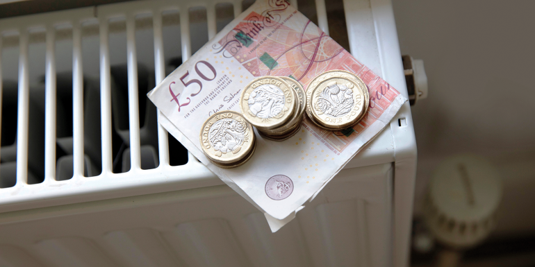 money on radiator- CREDIT-shutterstock-2178239855