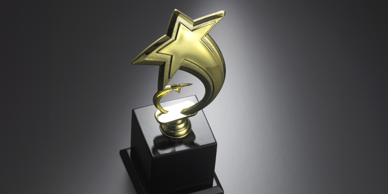 star shape of trophy on the gray background . CREDIT-shutterstock-413929972