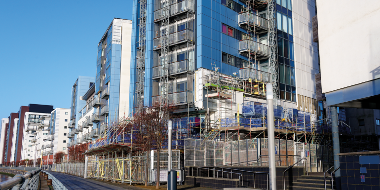 High rise residential building.CREDIT_shutterstock_2250232137
