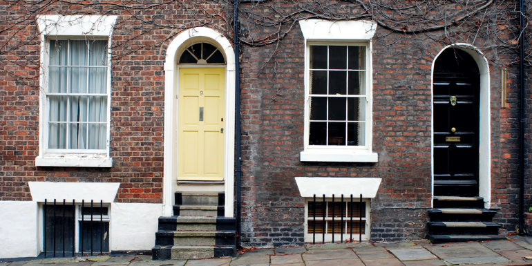brick houses front doors. credit_istock-89499718