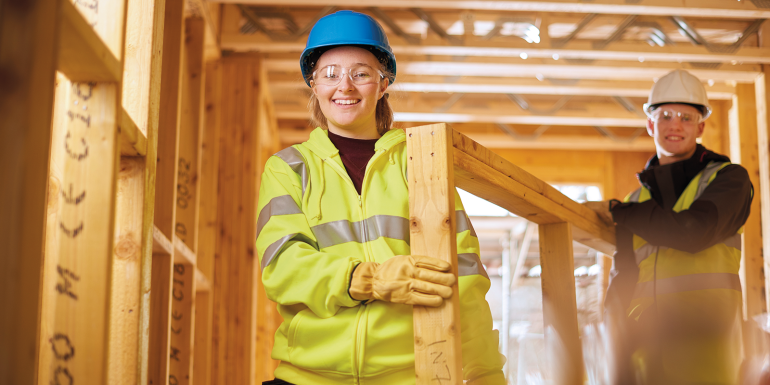 builders carrying. credit_istock-647763608