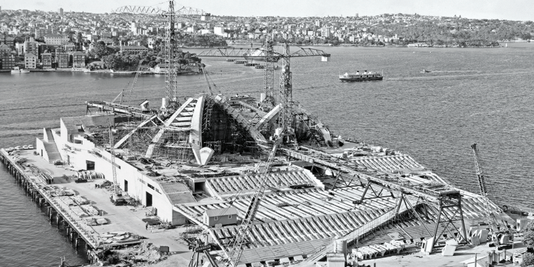 Black and white photo of Opera House construction.CREDIT_gettyimages