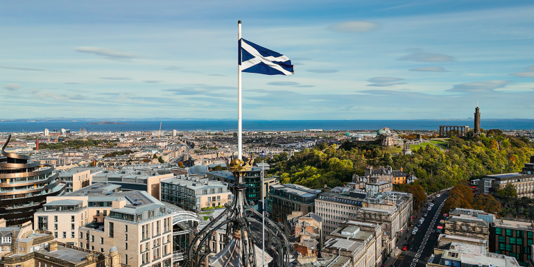 Aerial view of Edinburgh old town, aerial view of the scottish flag in Edinburgh
