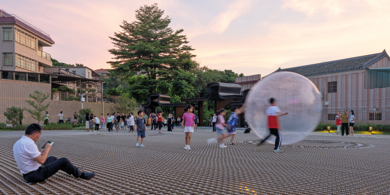   In Changshou Village in Shenzhen a new public space has been created on the mesh above, while the water body is retained below. CREDIT_zxd-architects