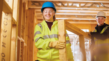 builders carrying. credit_istock-647763608