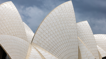 Sydney Opera House with iconic sail-like roofs.CREDIT_istock-1484231980