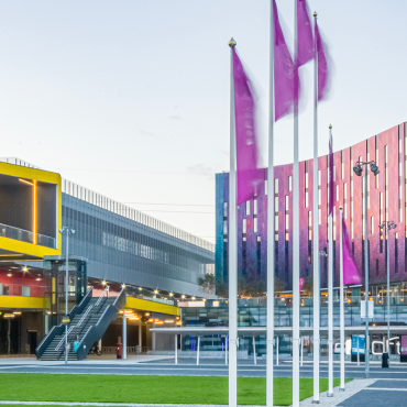 Modern buildings with colorful, futuristic architecture. CREDIT_shutterstock_2539769189