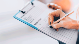 Facility management technician filling inspection-Image credit-iStock-499147978