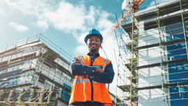 Engineer, construction and portrait of a black man at building site for development and architecture. CREDIT_shutterstock_2302260709