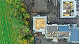House development construction site in progress aerial view UK - CREDIT- istock- 1306324733