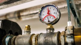 Thermometer on the hot water supply pipe to the heating system.alamy_2d4tmpe