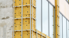 Building renovation, facade wall insulation preparing for cladding.CREDIT-shutterstock-2391581025