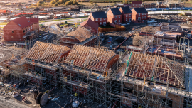Aerial view of a construction site with new build. CREDIT - Shutterstock - 2384416179