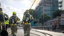 fire fighters walking. CREDIT_Getty-2168532681