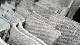 stack of asbestos roofing sheets. credit_adam-sadlak_istock-1490725072