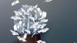 Building in snowglobe flying papers. CREDIT_istock-1061727872_istock-2172359581