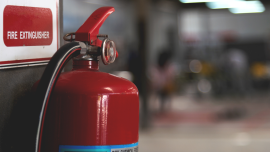  red fire extinguisher. credit_istock-1058291060
