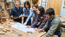 diverse group young apprentices collaborates experienced.Credit_Robert-Kneschke_shutterstock_2559760201