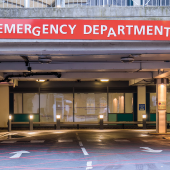 Hospital emergency department entrance, red signage visible.CREDIT_istock-641284652.
