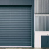 Huge rolling garage door stock photo.credit_istock-1461266875