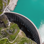 Overhead aerial view of Stausee Mooserboden Dam, Kaprun, Austria . CREDIT_iStock-1248957846