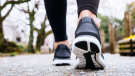 Woman Legs Sport Shoe Walk In Park Outdoo.iStock-961726470