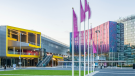 Modern buildings with colorful, futuristic architecture. CREDIT_shutterstock_2539769189